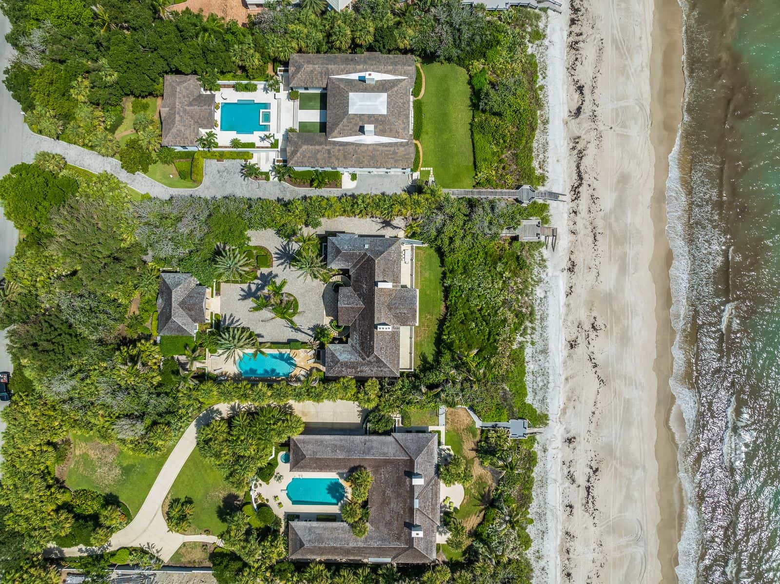 Aerial photo of a birds eye view overlooking a beach home.